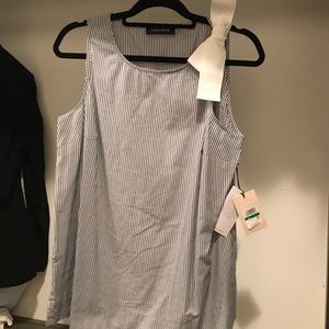 Sleeveless striped Summer top. Cute!